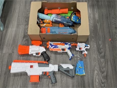 BOX OF NERF BRAND GUNS & BULLETS