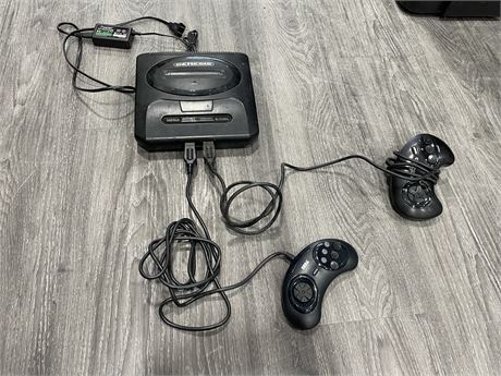 SEGA GENESIS WITH 2 CONTROLLERS (POWERS ON)
