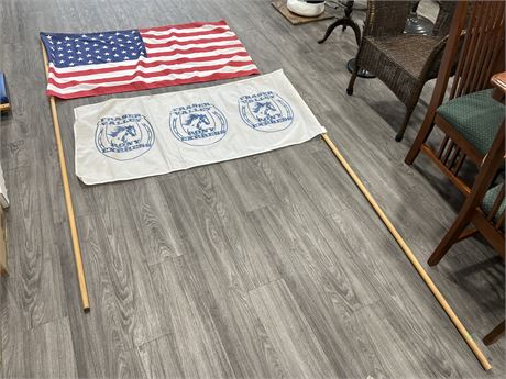 2 LARGE FLAGS W/WOOD POLES (flags are 57”x29”)