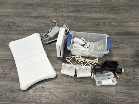 NINTENDO WII COMPLETE W/ ALL CORDS, CONTROLLERS, BALANCE BOARD AND ECT