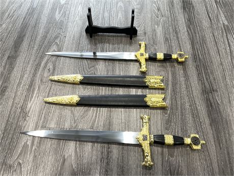2 DECORATIVE SWORDS W/ CASES AND STAND