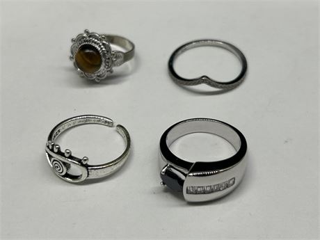 LOT OF 4 STERLING RINGS - ASSORTED SIZES