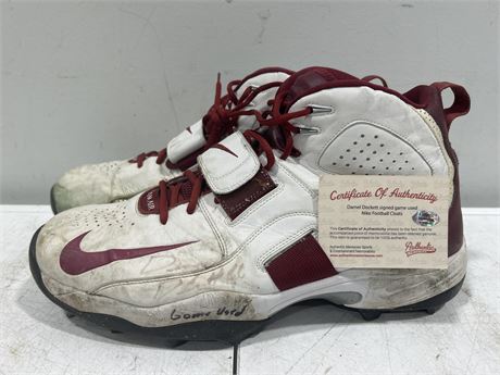DARBELL DOCKETT SIGNED/GAME USED CLEATS W/COA