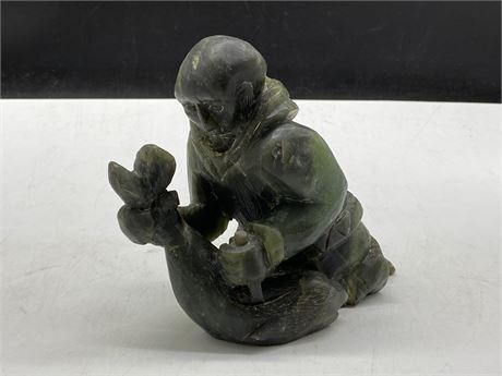 INUIT STONE SCULPTURE - MAN HOLDING SEAL (6” TALL)