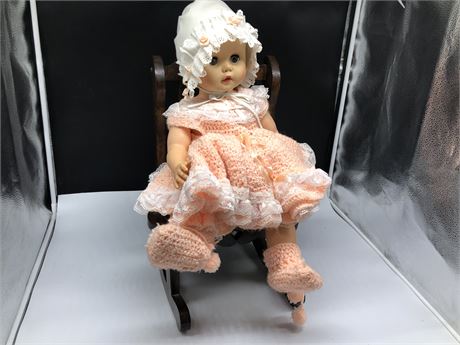 VINTAGE DOLL ON WOOD ROCKING CHAIR 17”