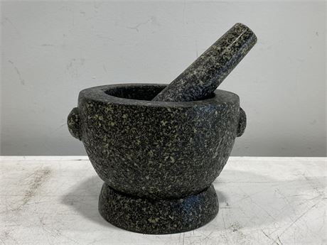 LARGE HEAVY GRANITE MORTISE AND PESTLE STAMPED ON BOTTOM (7”X5.5”)
