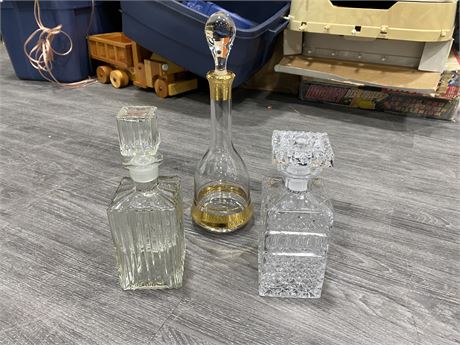 LOT OF 3 GLASS AND CRYSTAL DECANTERS - TALLEST ONE 14.5”