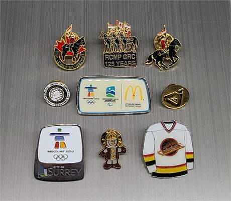 COLLECTION OF COLLECTIBLE RCMP, OLYMPIC AND CANUCKS, ETC. PINS