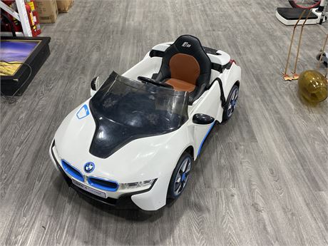 KIDS BMW ELECTRIC CAR - NEEDS BATTERY (48”X21”X19”)