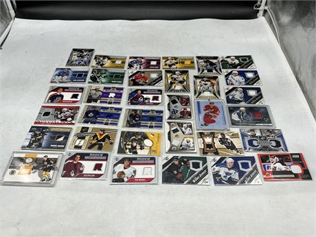 35 NHL GAME USED JERSEY CARDS - INCLUDES LEMIEUX, ROOKIE BOURDON, ETC