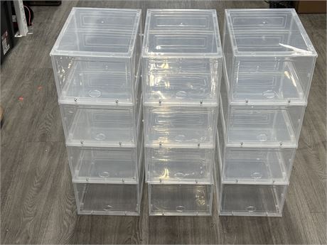 12 STACKABLE PLASTIC STORAGE COMPARTMENTS - EACH MEASURES 13”x10”x7” TALL