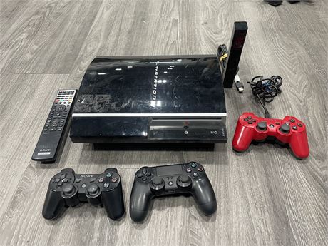 PS3 CONSOLE ONLY W/ 2 CONTROLLERS, REMOTE, ETC