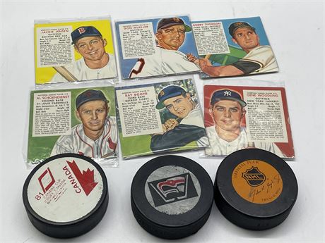 LOT OF 3 VINTAGE HOCKEY PUCKS & 6 1950’S RED MAN CHEWING TOBACCO BASEBALL CARDS