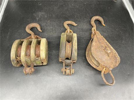 3 LARGE ANTIQUE PULLEYS (BIGGEST IS 16” - OTHER 2 ARE 12”)