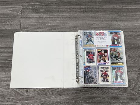 BINDER OF 270 PATRICK ROY CARDS - ROY ROOKIE IS A REPRINT