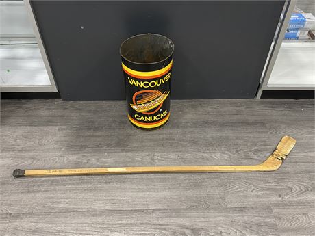1960’S VINTAGE WOODEN HOCKEY STICK W/CANUCKS CAN (19” TALL)