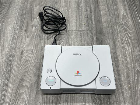 PLAYSTATION ONE CONSOLE - WORKS