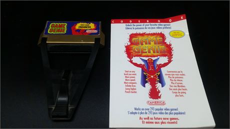 VERY GOOD CONDITION  - NINTENDO GAME GENIE WITH GUIDE BOOK