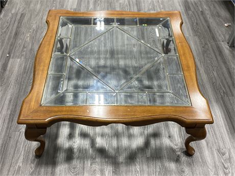 WOOD COFFEE TABLE WITH GLASS CENTRE (42”x42”x17”)