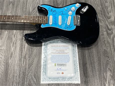 TOM PETTY & THE HEARTBREAKERS SIGNED GUITAR (WITH COA)