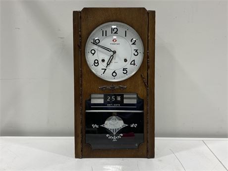 VINTAGE FRONTIER 31 DAY WALL CLOCK DAY-DATE