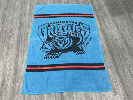 1994 VANCOUVER GRIZZLIES BLANKET - HAS SOME WEAR - 50” X 74”