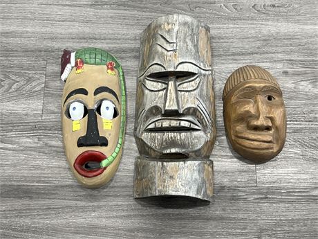 3 CARVED WOOD MASKS - 2 NATIVE, 1 INDONESIAN (Largest is 19” tall)