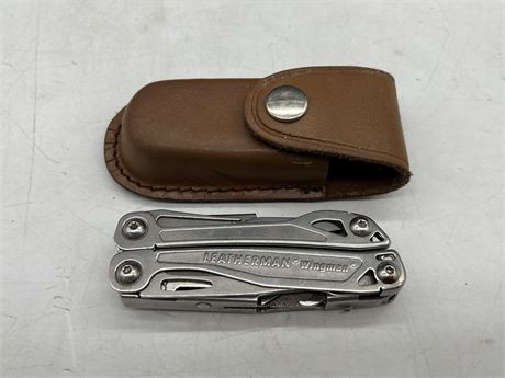 LEATHERMAN MULTI USE TOOL W/POUCH