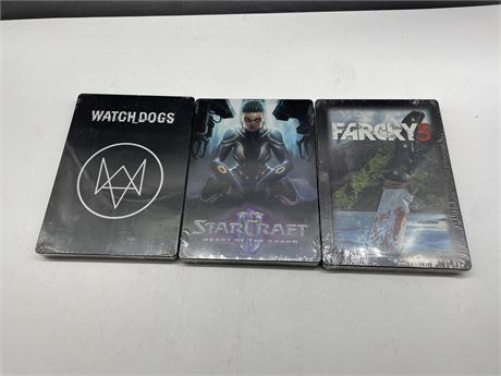 3 SEALED PC VIDEO GAME STEELBOOKS FARCRY 3, STARCRAFT II, & WATCH DOGS