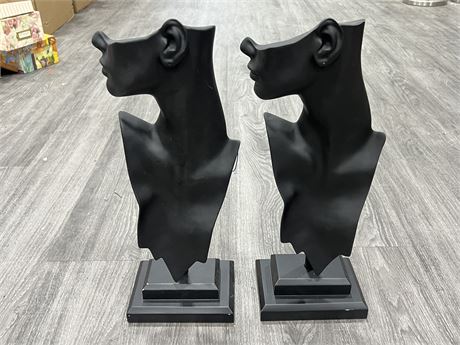 PAIR OF UNIQUE SCULPTURES ON STANDS (19” tall)