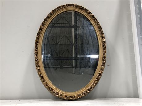 VINTAGE OVAL MIRROR 18X26” (MADE IN CANADA)