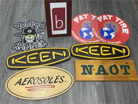 8 MISC SIGNS INCL FAT TIRE TIN SIGN, KEEN WOODEN, ETC (LARGEST 23”x8”)
