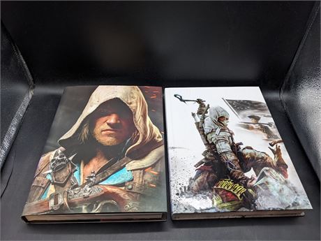 2 ASSASSINS CREED COLLECTORS EDITION HARDCOVER GUIDE BOOKS - EXCELLENT CONDITION