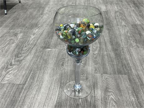 LARGE ELEVATED GLASS BOWL FULL OF MARBLES (16” tall)