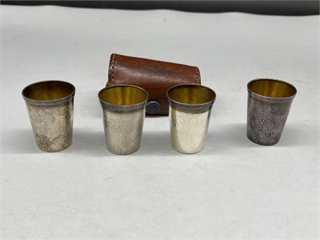 VINTAGE LEATHER CONTAINER W/4 MINI SILVER CUPS (Marked silver)
