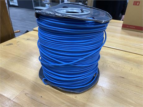 SPOOL OF BLUE WIRE