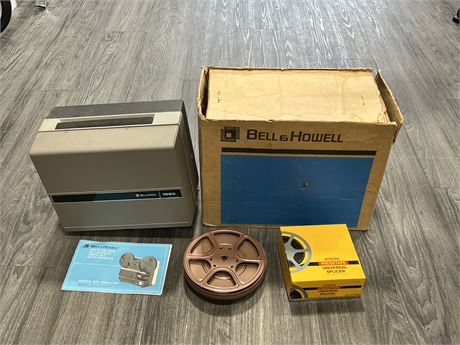 VINTAGE BELL + HOWELL PROJECTOR W/ EXTRA METAL REELS & ECT