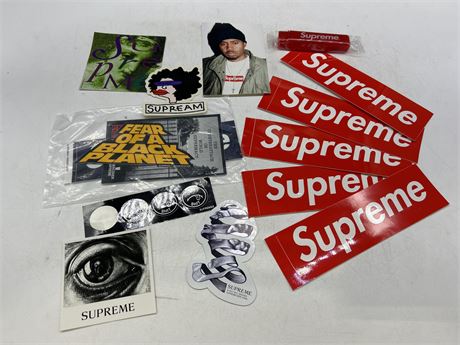 LOT OF SUPREME STICKERS AND NEW TOOTHBRUSH - INCLUDES NAS, PUBLIC ENEMY & OTHERS