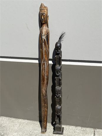 2 HAND CARVED AFRICAN WOOD SCULPTURES (Tallest is 52”)