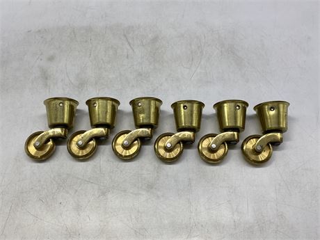 6 SMALL VINTAGE BRASS CASTERS - 3” TALL
