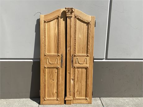 2 HAND CARVED WOODEN DOORS (EACH IS 20.5”X67”)