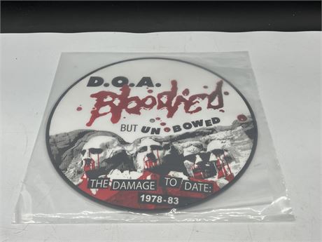 DOA - BLOODIED BUT UNBOWED - PICTURE DISC - NEAR MINT (NM)