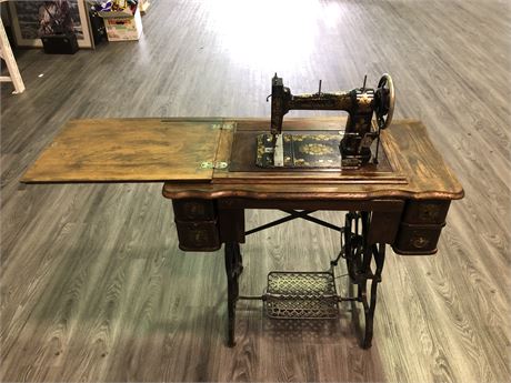 ANTIQUE SEWING MACHINE with extra leather drive cord & attachments