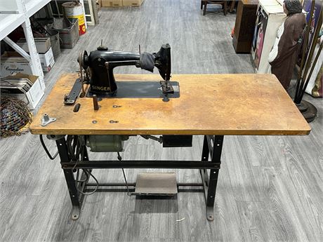 VINTAGE SINGER SEWING MACHINE W/TABLE (4ft wide)