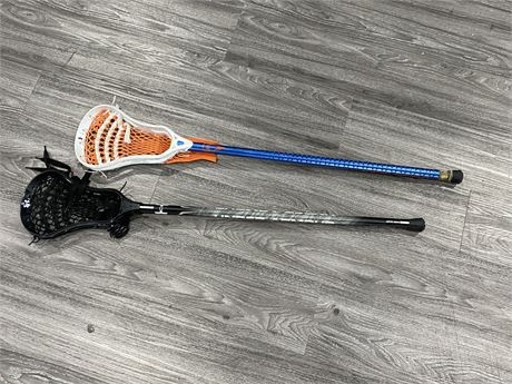 2 UNDER ARMOUR YOUTH LACROSSE STICKS