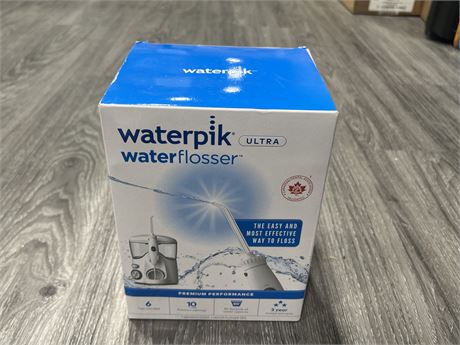 BRAND NEW WATERPIK ULTRA WATER FLOSSER