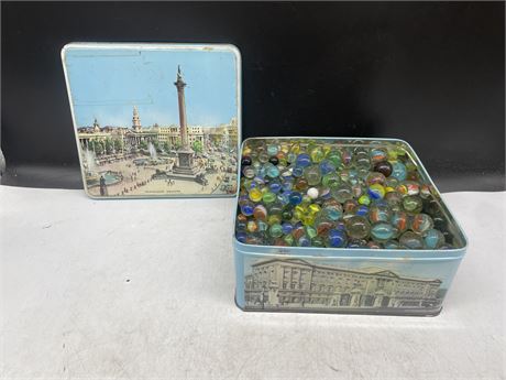 LARGE HEAVY TIN OF VINTAGE MARBLES 4” DEEP 9”x9”