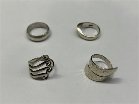 LOT OF 4 LARGER SIZED STERLING RINGS - SIZES 7 - 8.5