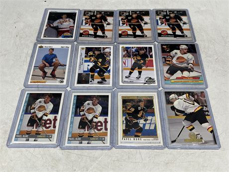 12 BURE CARDS INCLUDING ROOKIES