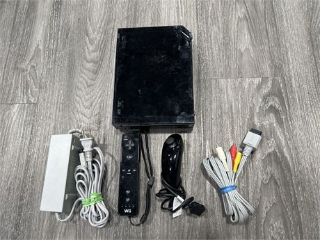 BLACK NINTENDO WII W/ CORDS & CONTROLLERS